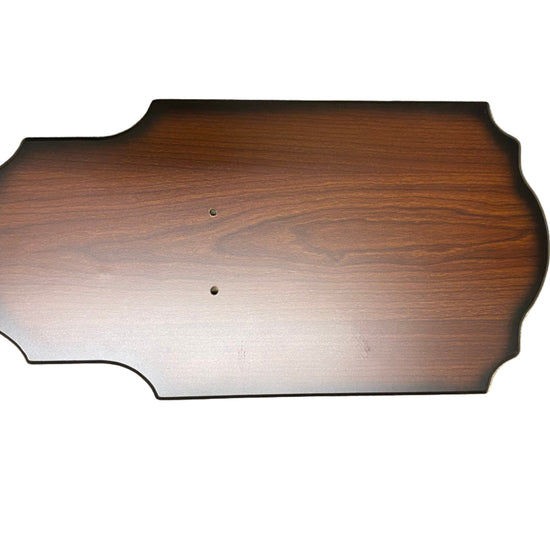 Wooden panel with a wavy edge on a white background