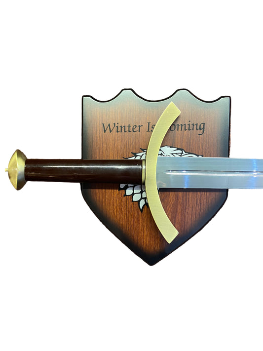 Sword on a wooden shield with 'Winter is Coming' text, Game of Thrones theme