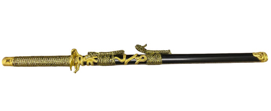 Decorative sword with gold and black design on a white background