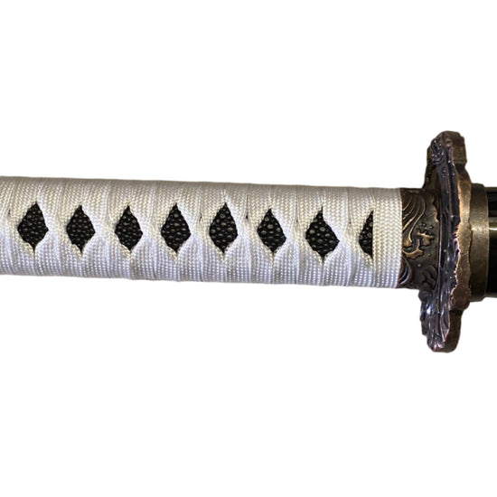 Sword with a black and white handle on a white background