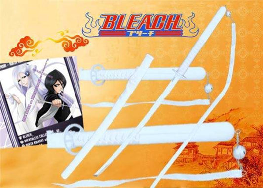 A replica katana sword from the anime Bleach, with a white, snowflake-like tsuba and a white hilt. The image also includes a cartoon depiction of the character Rukia Kuchiki holding a similar sword.