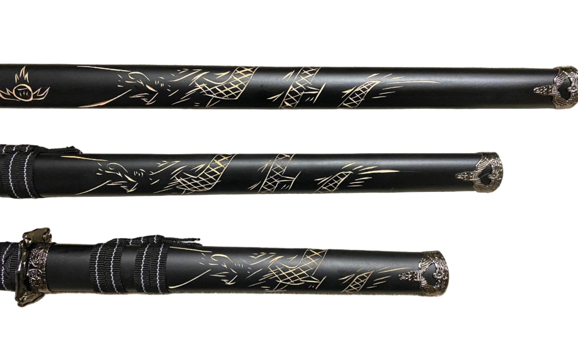Three black swords with engraving on a white background