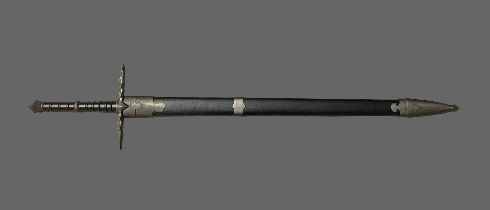 Sword with a black handle and silver blade on a gray background