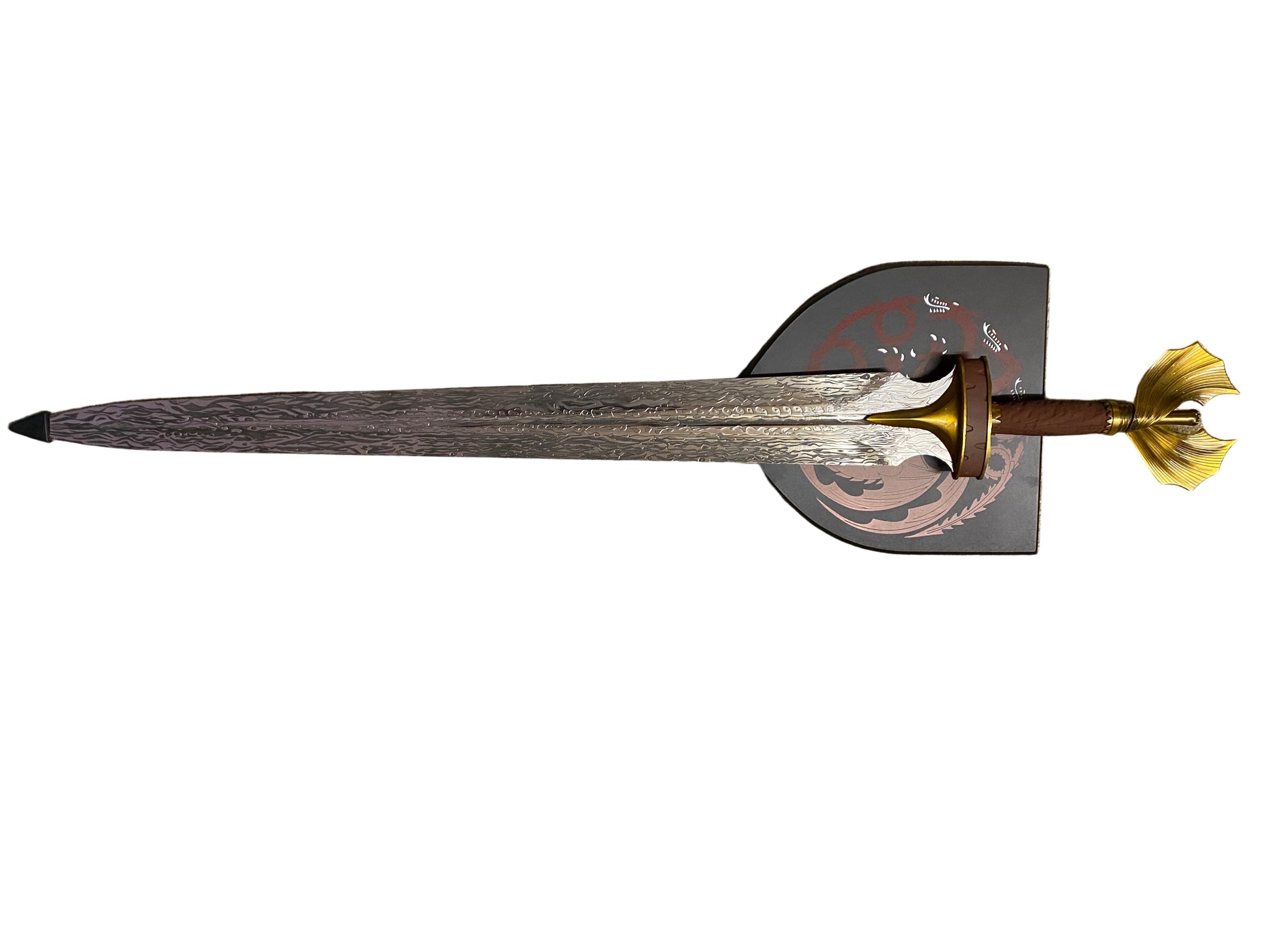 Decorative sword with a gold hilt on a white background