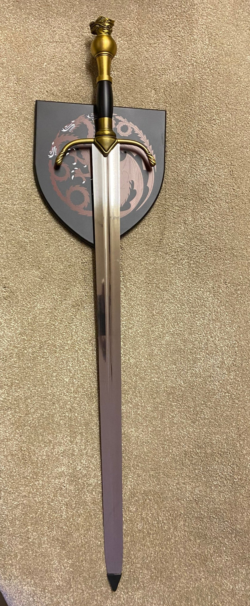 Sword with a decorative sheath