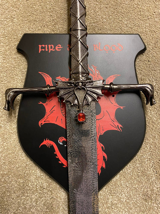 Decorative axe with dragon design and 'Fire' text on a beige background