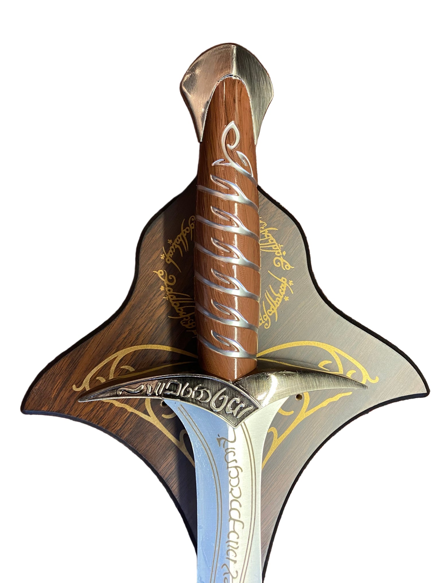 Decorative sword with wooden handle and silver blade on a textured brown background