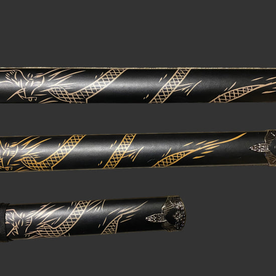 Black sword with gold dragon design on a dark background