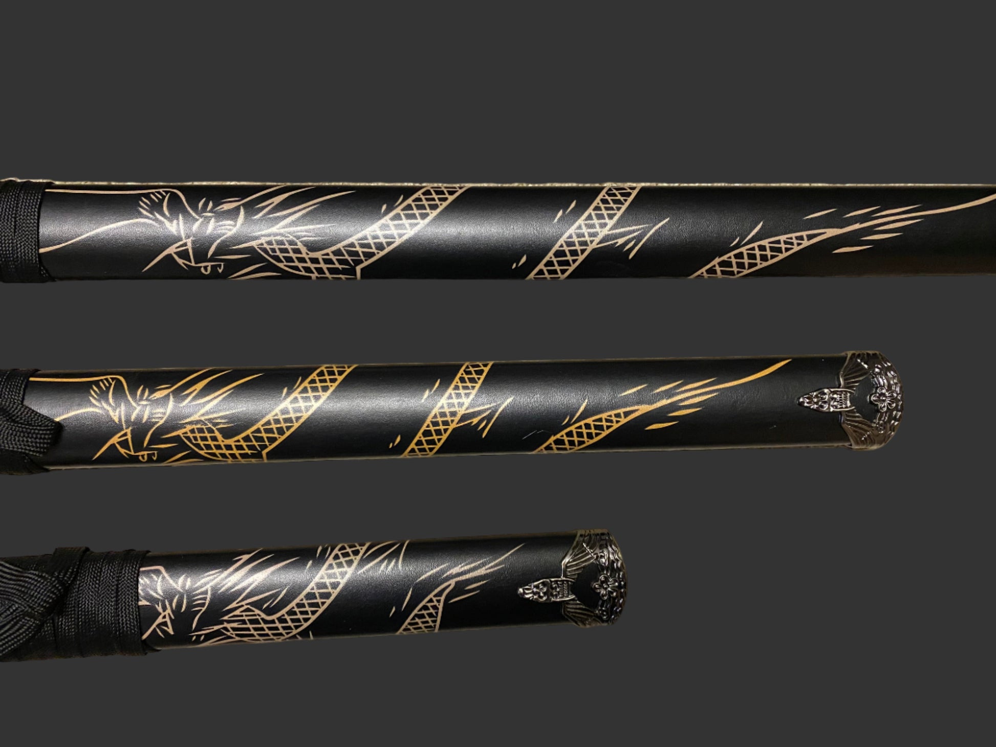 Black sword with gold dragon design on a dark background