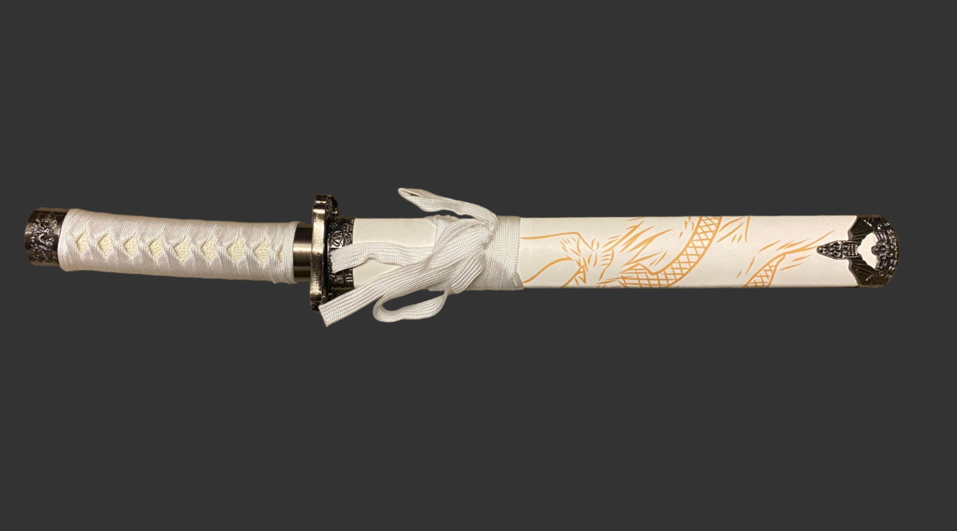 Decorative sword with white handle and gold patterns on a black background