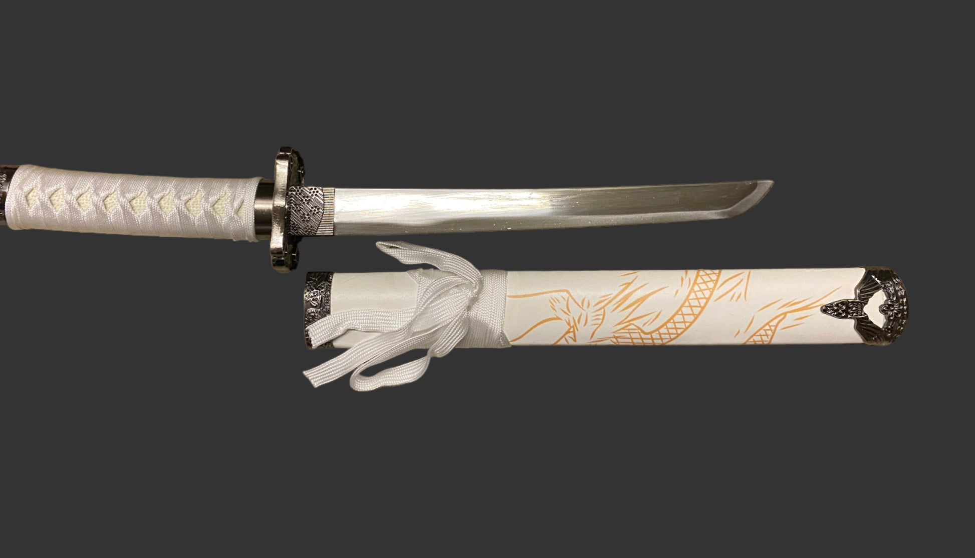 Decorative sword with white sheath featuring dragon designs on a black background