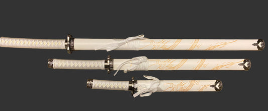Set of white swords with gold accents on a black background