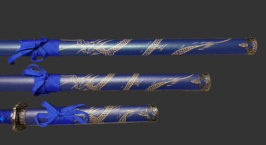 Three blue sword sheaths with silver dragon designs on a dark background