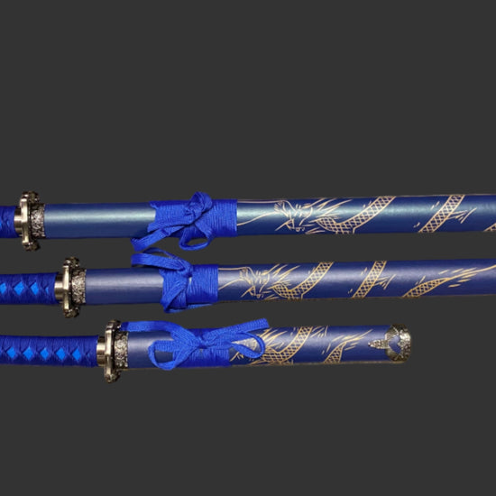 Set of blue swords with gold accents on a black background