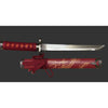Sword with red sheath featuring dragon design on a black background