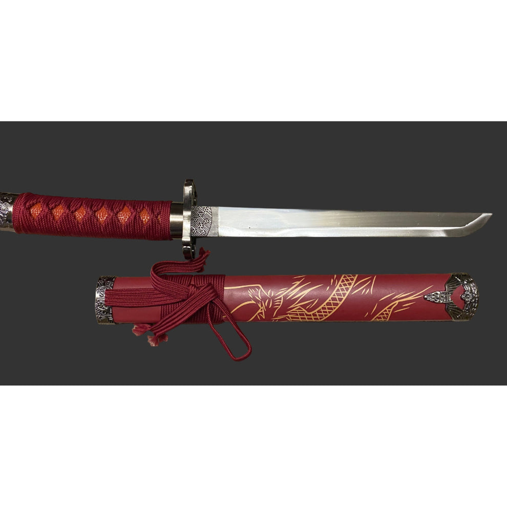 Sword with red sheath featuring dragon design on a black background