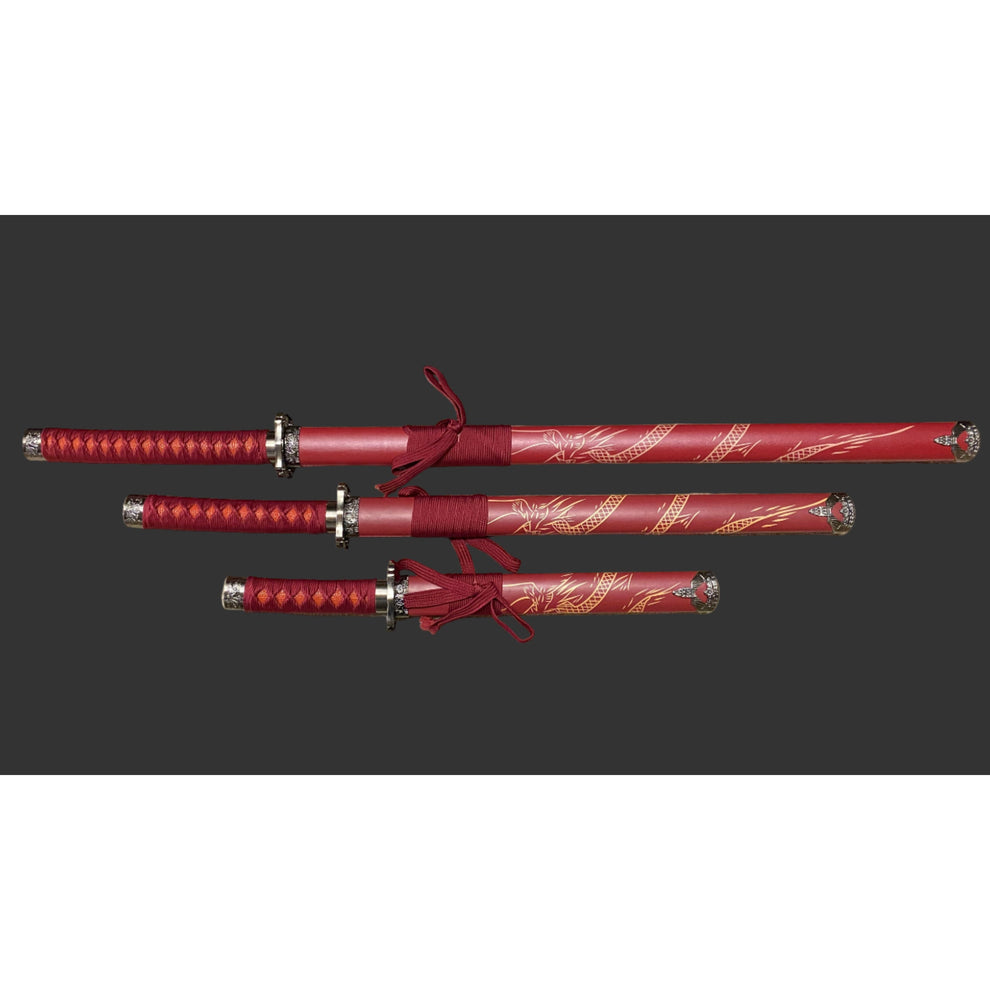 Set of red swords with decorative handles on a dark background