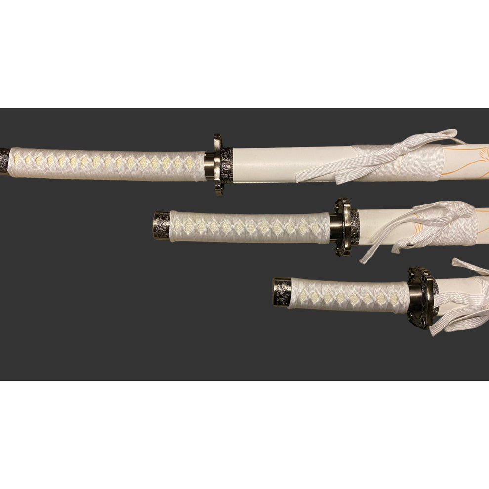 Three white swords with black accents on a dark background