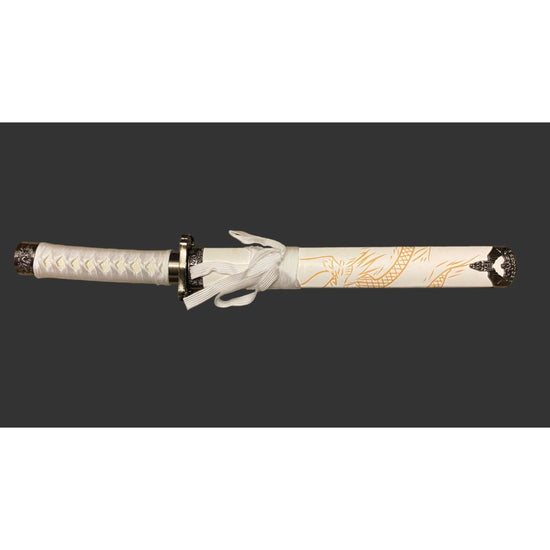 Decorative sword with white handle and gold patterns on a black background