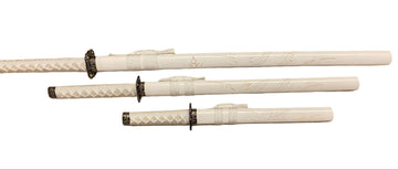 Set of three white swords with black hilts on a white background
