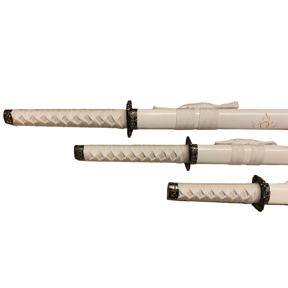 Three white swords with black handles on a white background