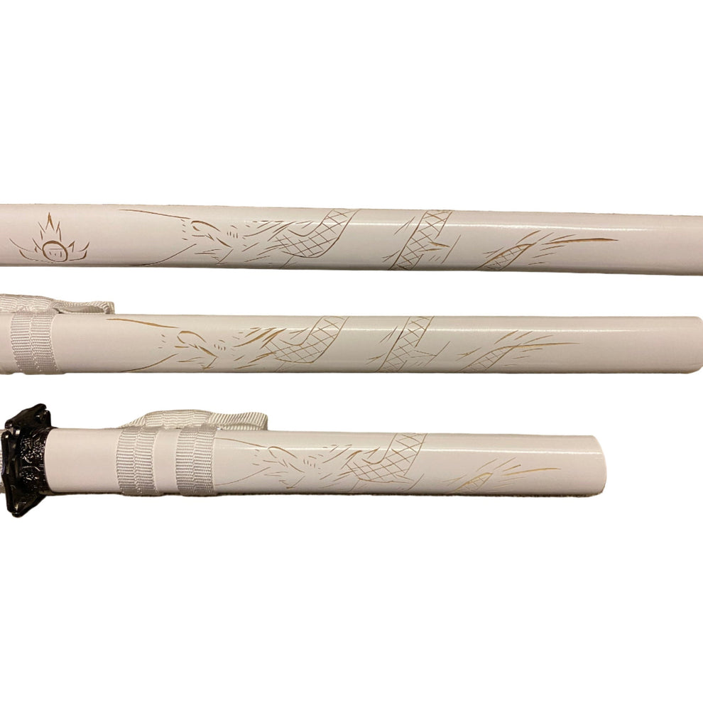 Close-up of a white rifle stock with engraved designs on a white background
