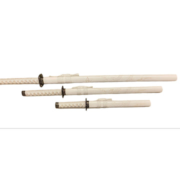 Set of three white swords with black hilts on a white background