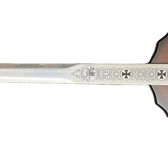 Decorative sword with a wooden sheath on a white background