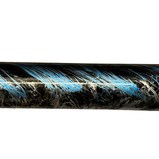 Close-up of a textured black and blue rod on a white background