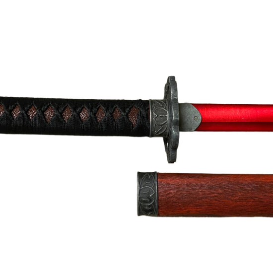 Sword with a red blade and wooden sheath on a white background