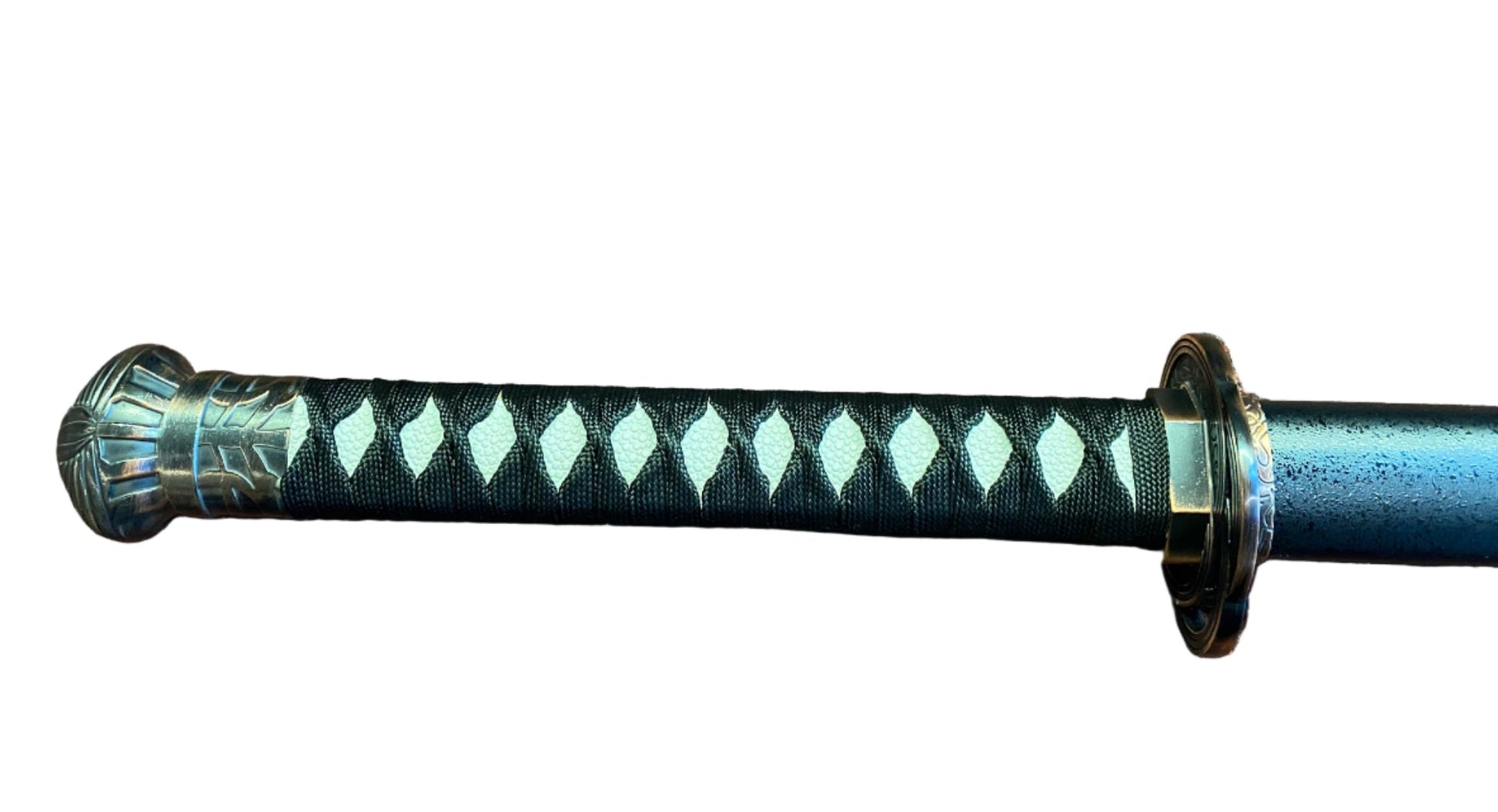 Decorative sword handle with a patterned grip on a white background