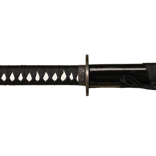 Black sword with decorative handle on a white background