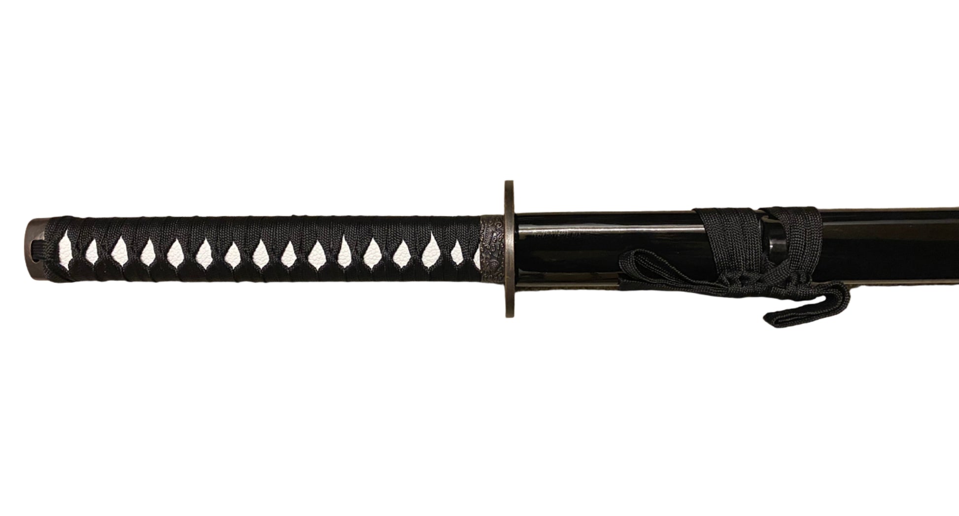 Black sword with decorative handle on a white background