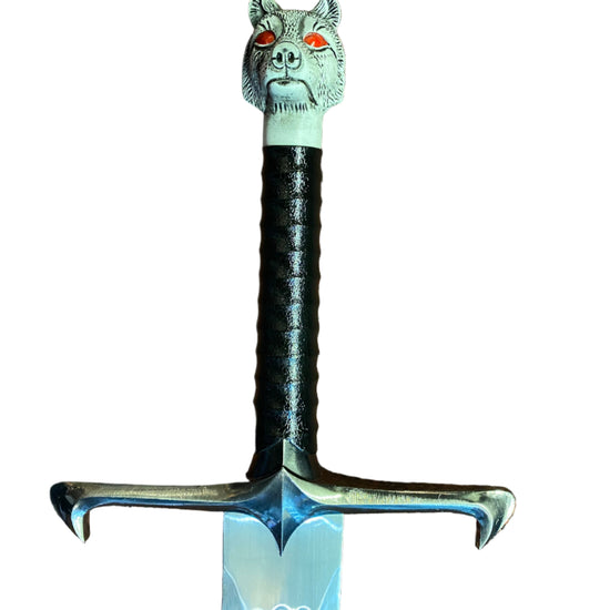 Decorative sword with a wolf head handle on a white background