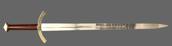 Sword with a gold blade and brown handle on a gray background