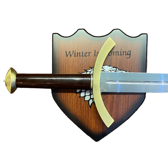 Sword on a wooden shield with 'Winter is Coming' text, Game of Thrones theme