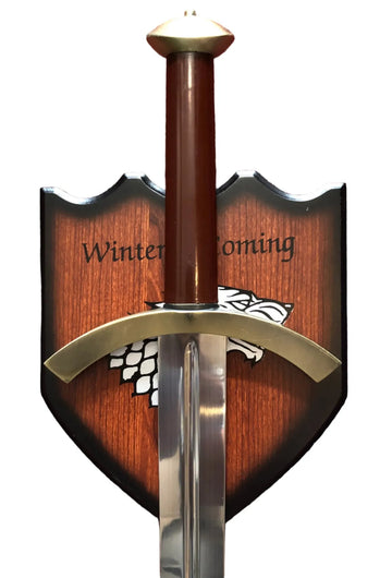 Sword with wooden sheath featuring 'Winter is Coming' text and a white wolf emblem on a red background.