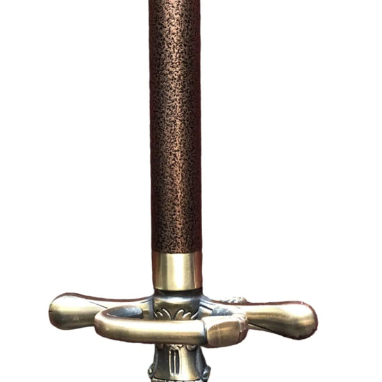 Decorative sword with a detailed hilt on a white background