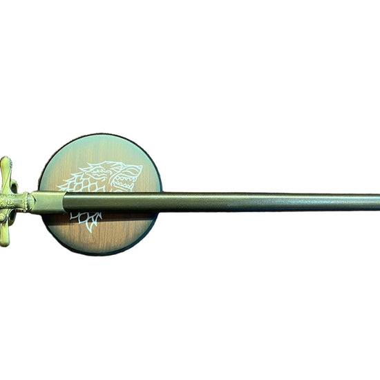 Decorative sword with a circular blade on a white background