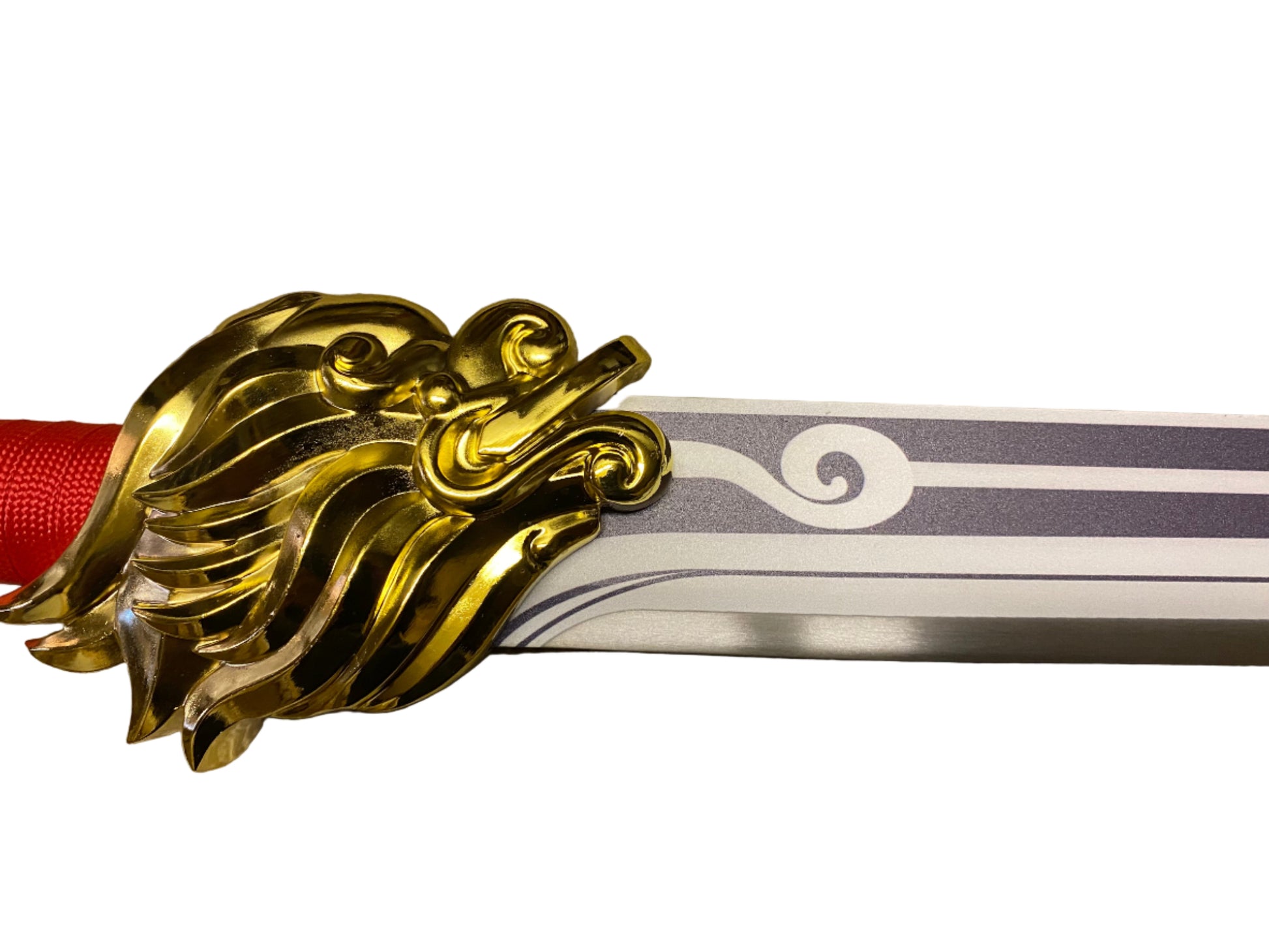 Decorative sword with gold dragon hilt on a white background