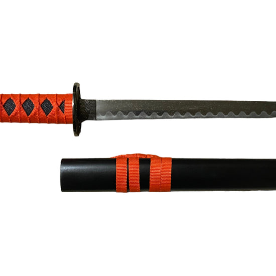 Katana sword with red and black handle on a textured surface
