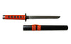 Katana sword with red and black handle on a textured surface