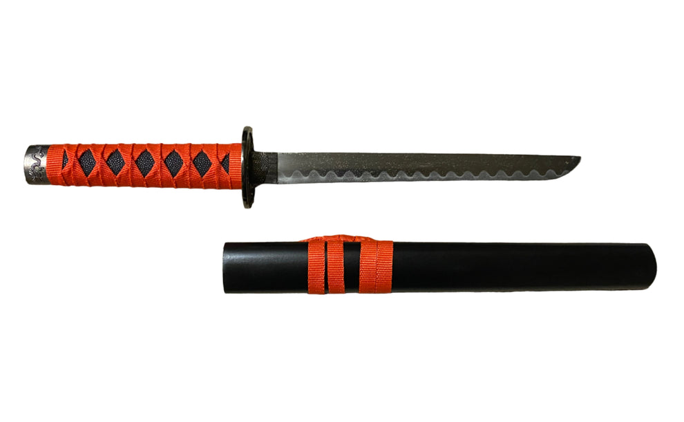Katana sword with red and black handle on a textured surface