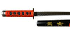 Sword with red handle and black blade on a gray surface