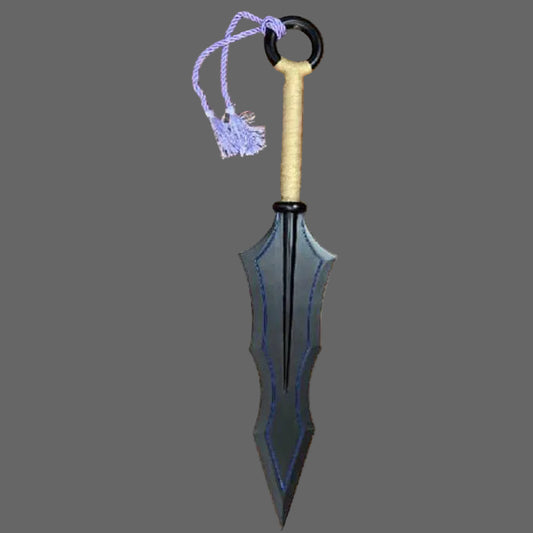Black and gray sword with a wooden handle on a wooden surface