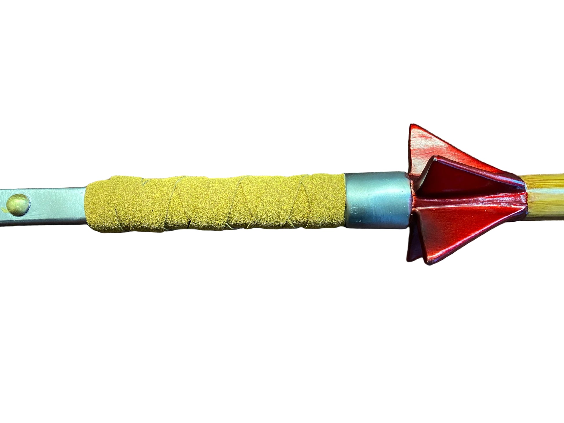 Close-up of a dart with a yellow grip and red and blue tip on a white background