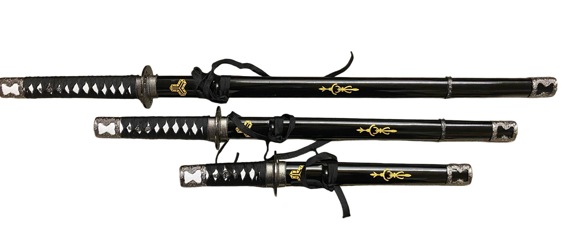Three black samurai swords with gold accents on a gray background
