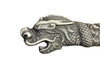 Decorative dragon head sculpture on a white background