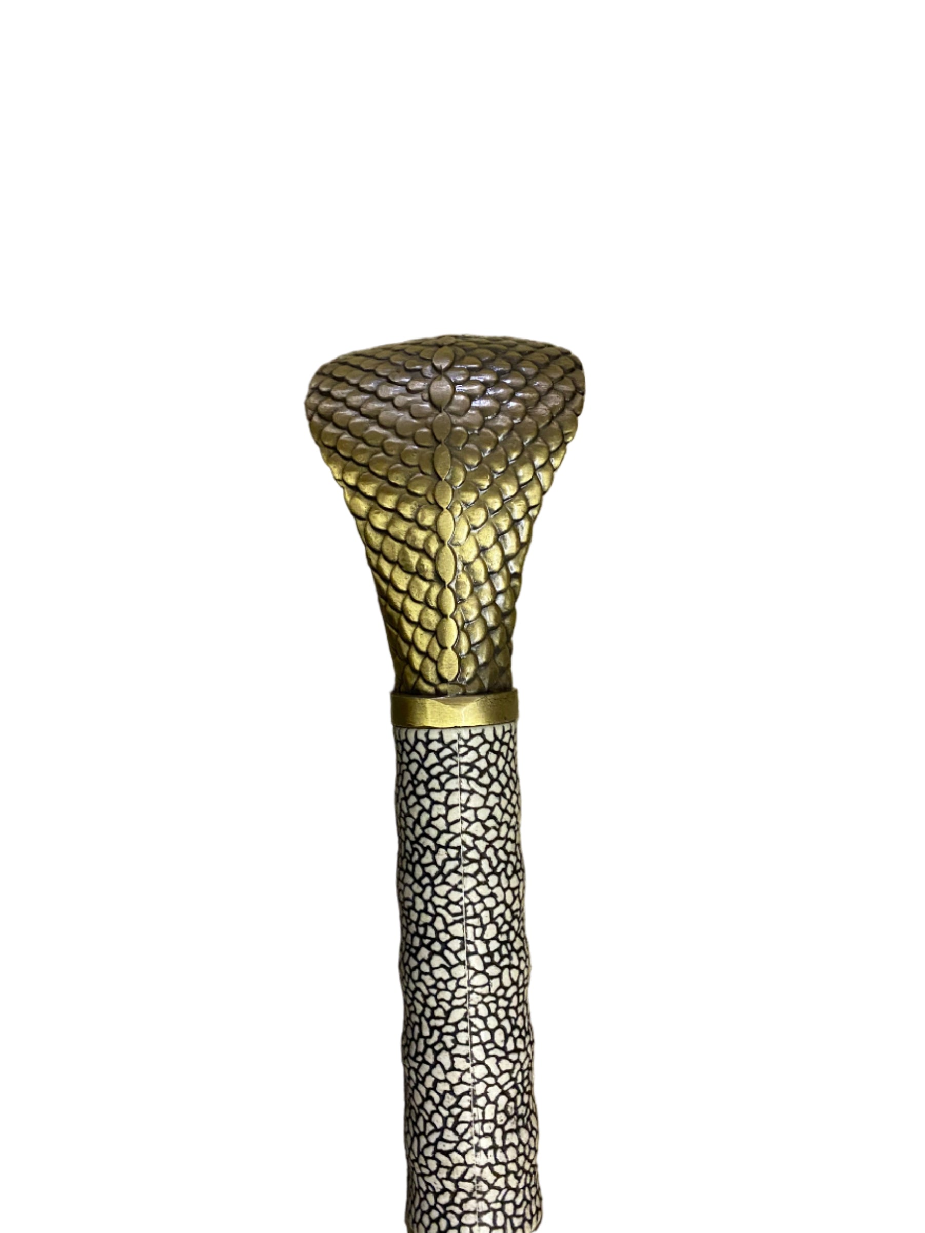 Decorative object with textured gold top and base on a white background