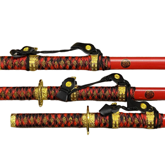 Red and black sword with gold accents on a white background